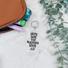 Load image into Gallery viewer, &quot;Drive Safe You Beautiful B**ch&quot; Motel Keychain
