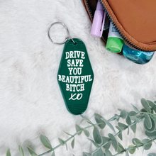 Load image into Gallery viewer, &quot;Drive Safe You Beautiful B**ch&quot; Motel Keychain
