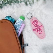 Load image into Gallery viewer, &quot;Drive Safe You Beautiful B**ch&quot; Motel Keychain
