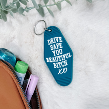 Load image into Gallery viewer, &quot;Drive Safe You Beautiful B**ch&quot; Motel Keychain
