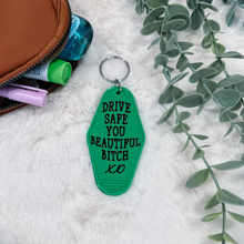 Load image into Gallery viewer, &quot;Drive Safe You Beautiful B**ch&quot; Motel Keychain

